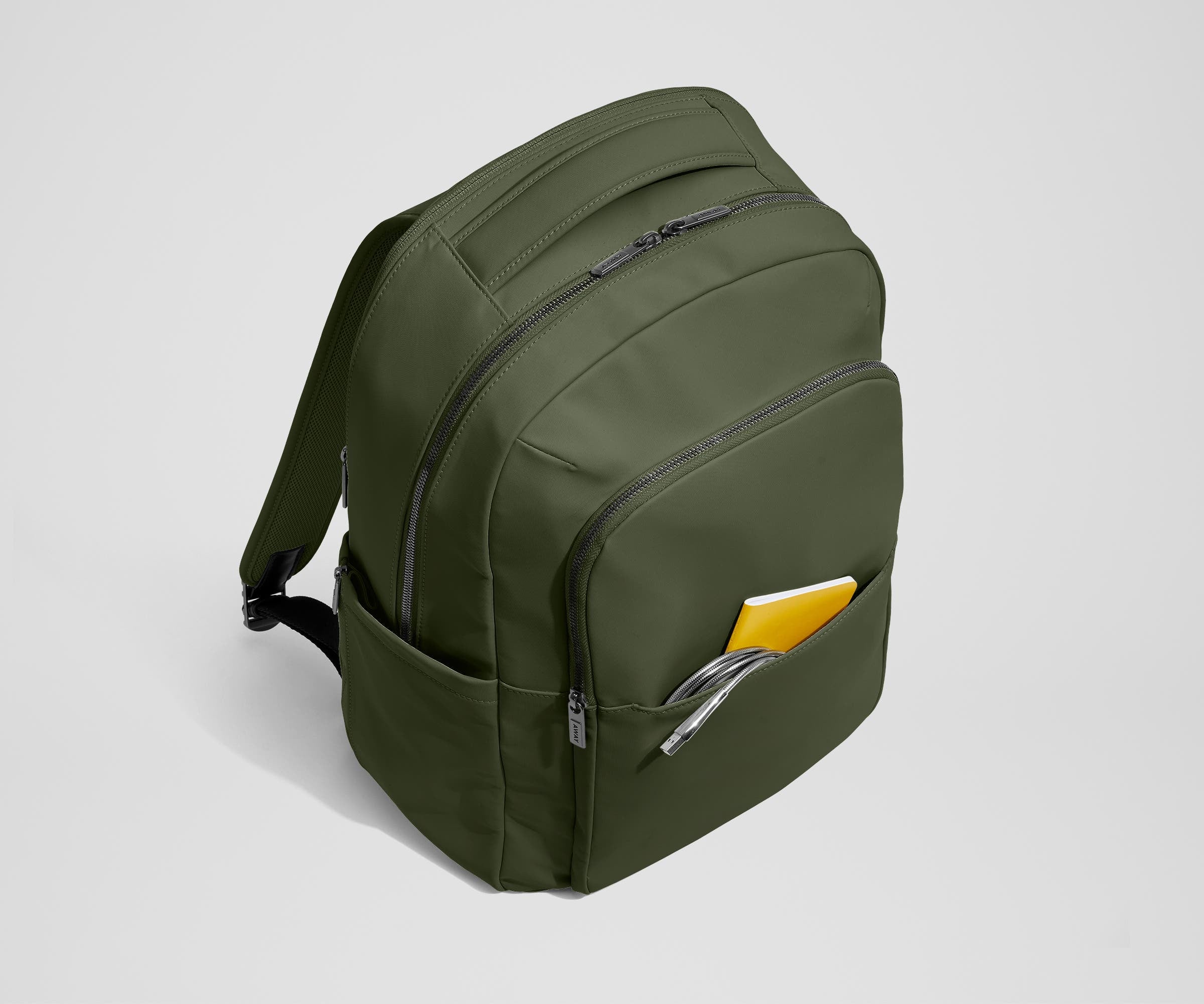 Front slip pocket with small notebook and charging cord