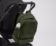 Backpack attached to a stroller using the included stroller clips