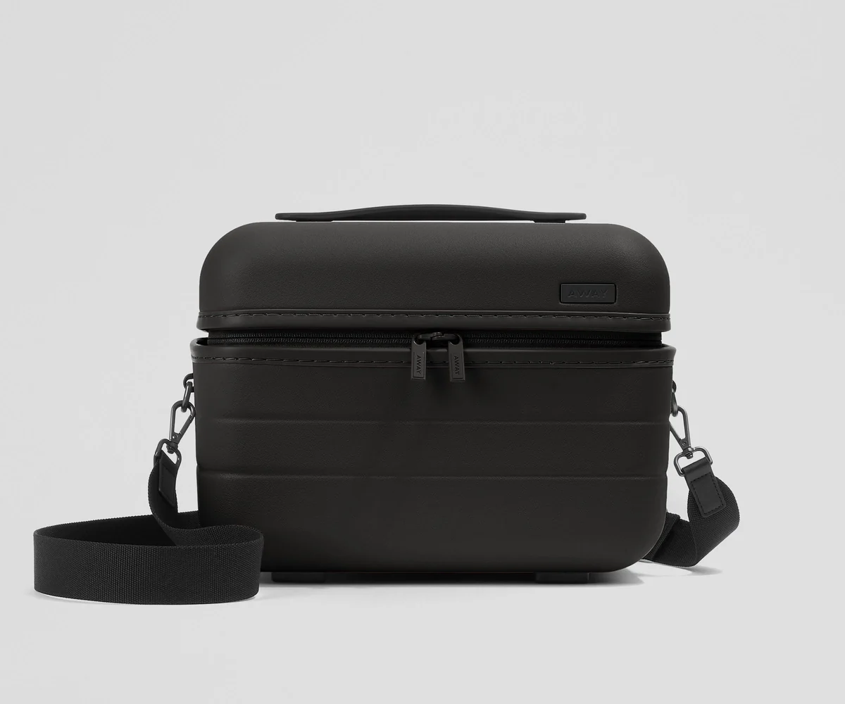Front view of the Train Case with a detachable shoulder strap
