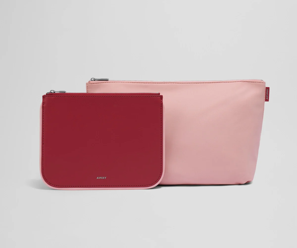 Small leather pouch and large nylon pouch in contrasting colors