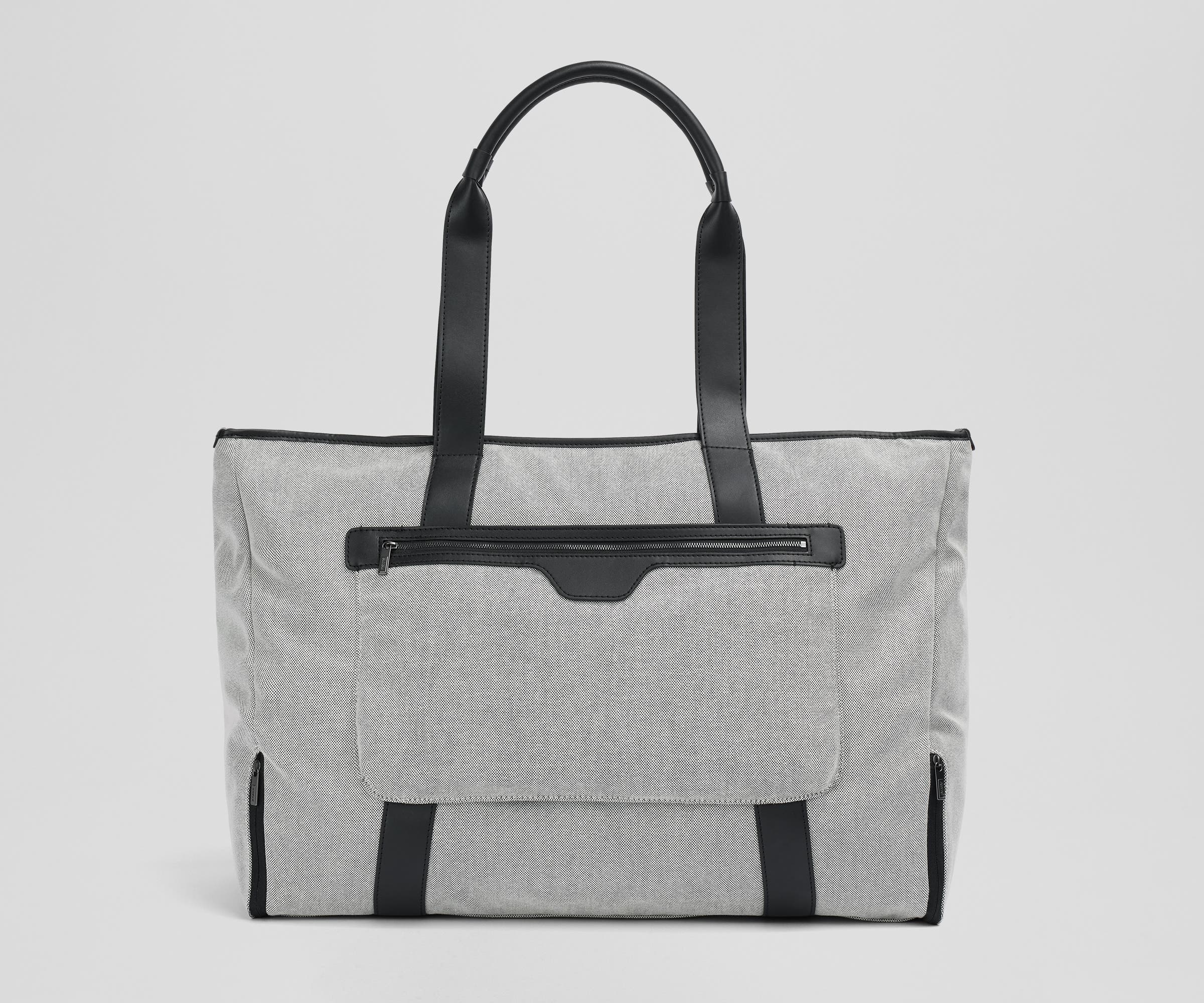 Trolley sleeve on the back of the Transit Canvas Tote