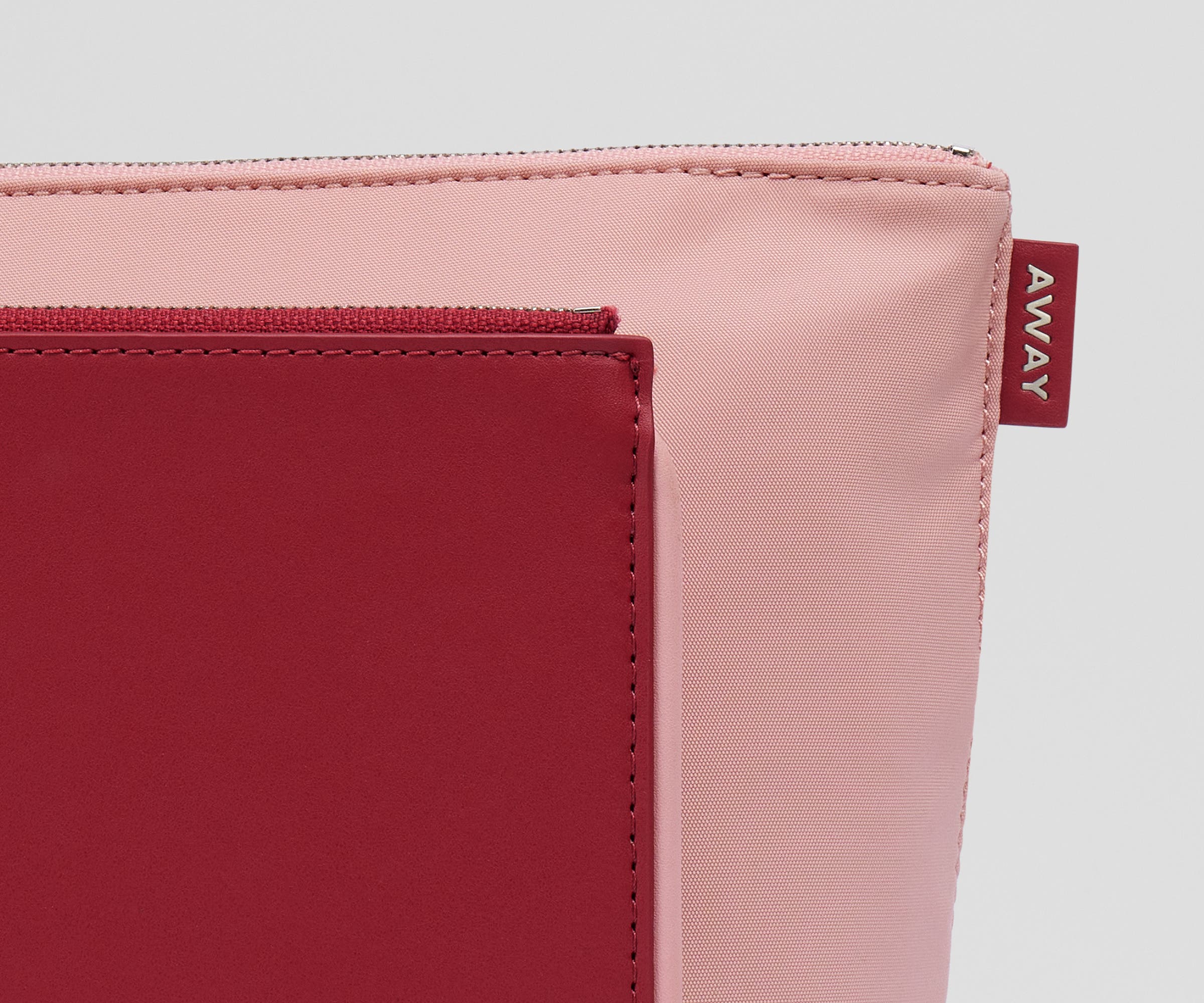 Detailed view of the leather and nylon pouch material