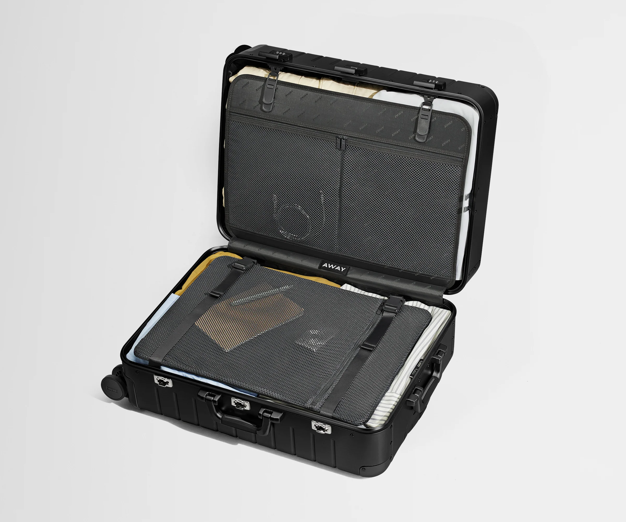 Compression pad and interior organization system of the Medium: Aluminum Edition in Onyx Black