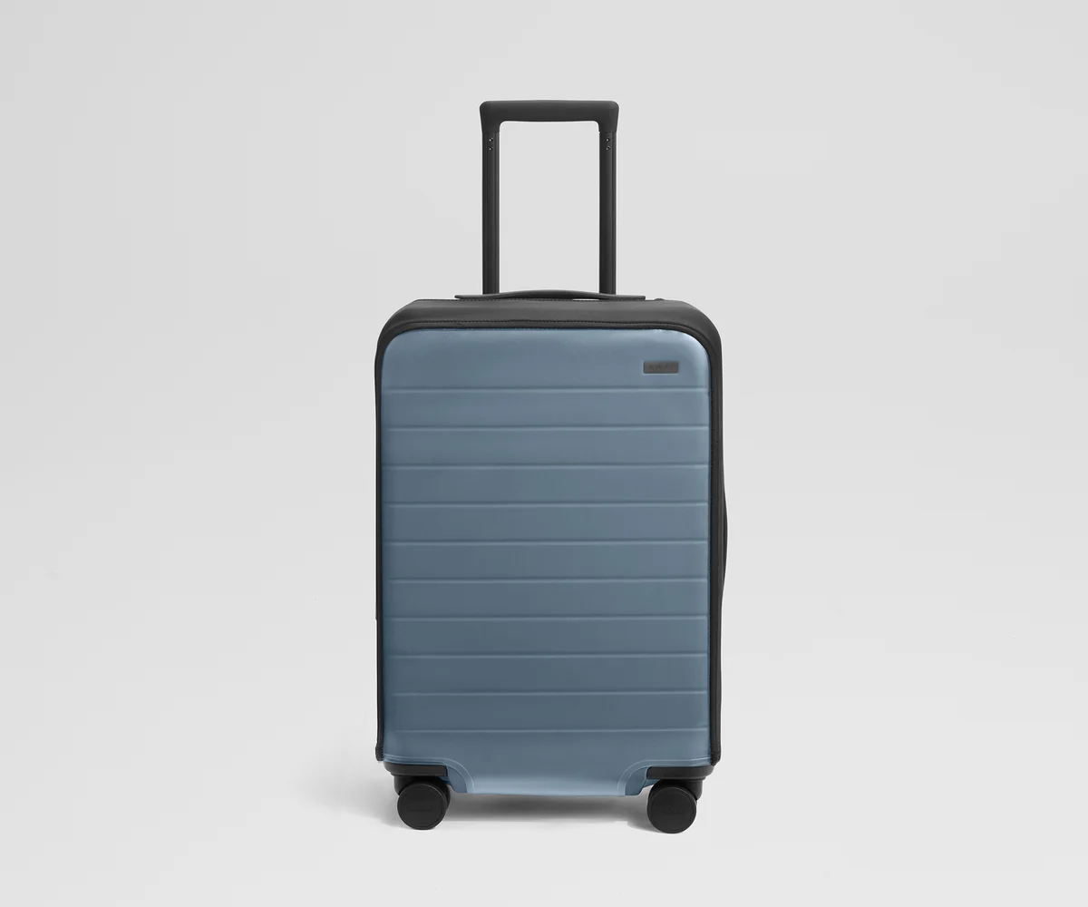 Clear Luggage Cover in The Bigger Carry-On
