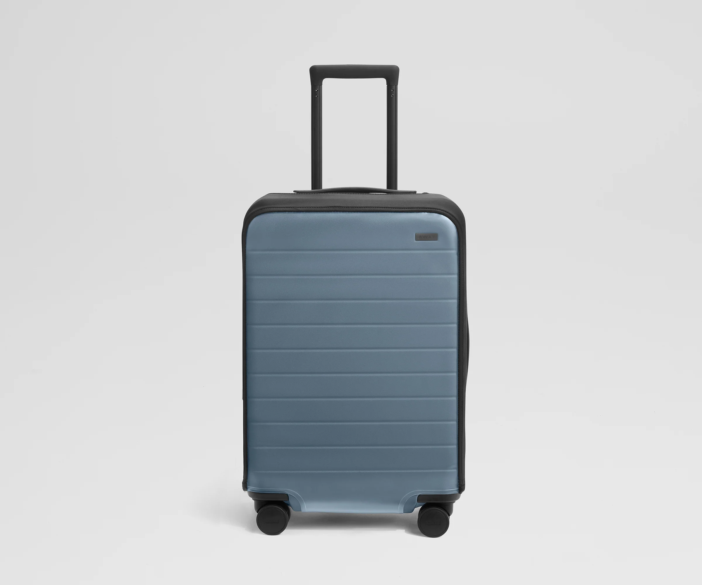 Clear Luggage Cover in The Bigger Carry-On