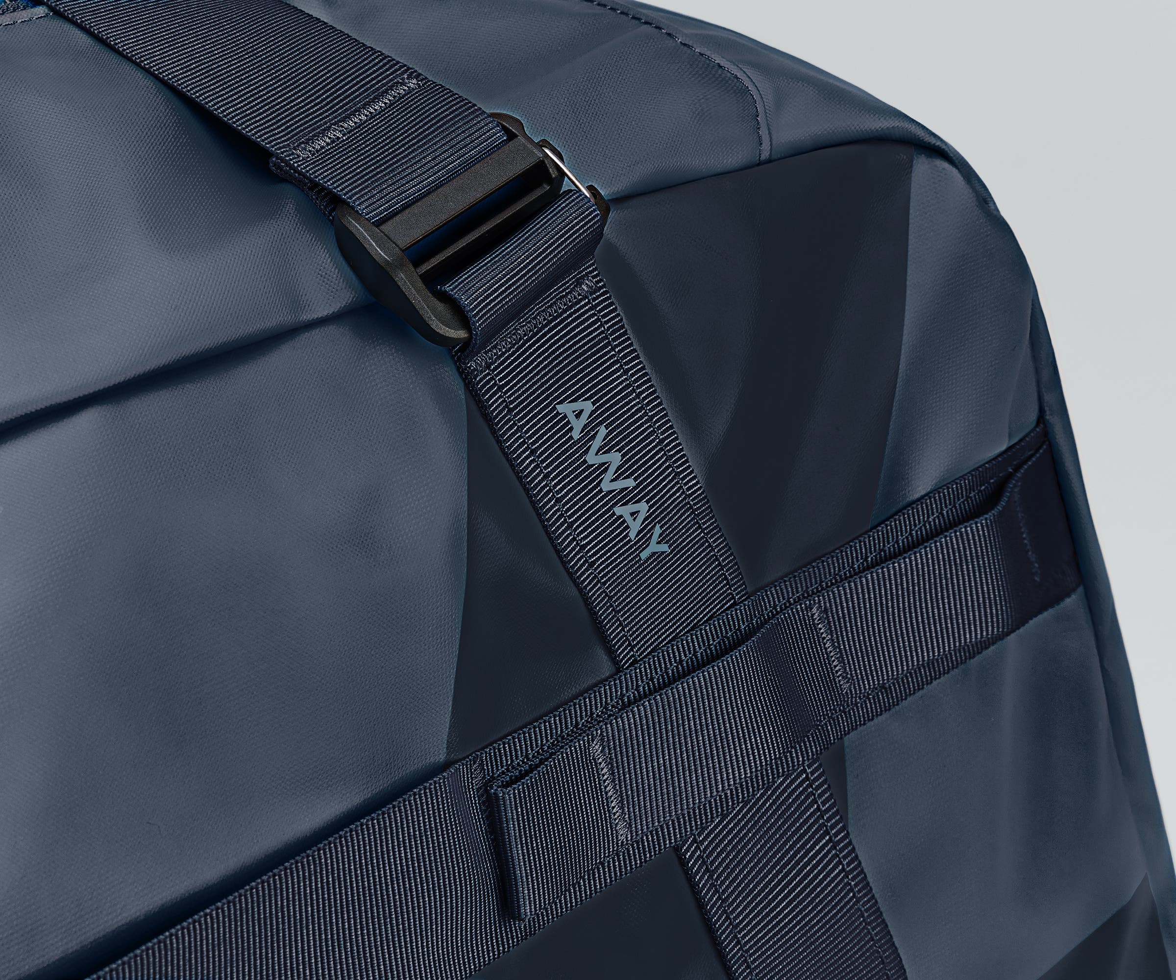 Close up view of the abrasion-resistant material and Away logo