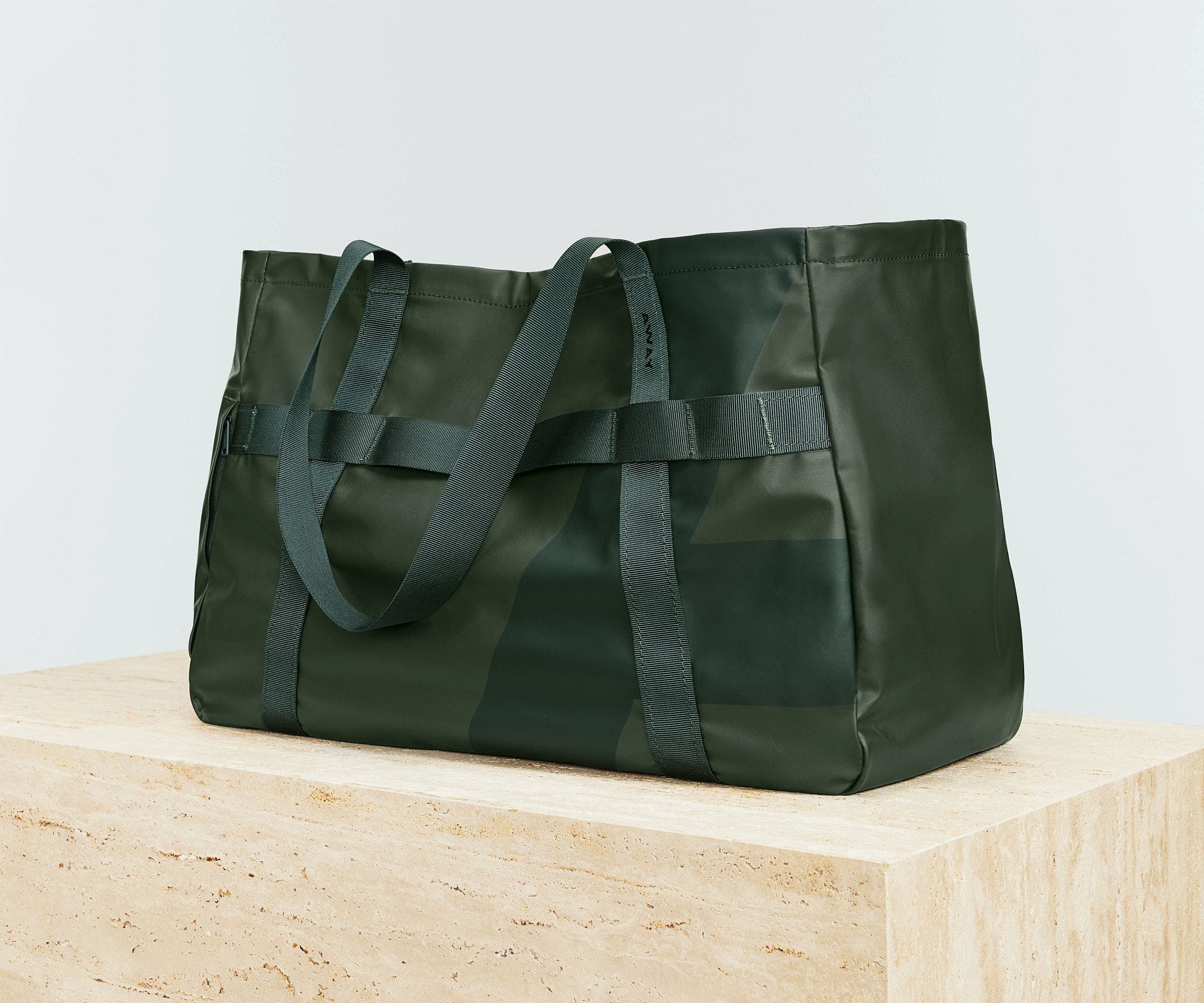 Angled view of the Active Tote 45L with the handles down