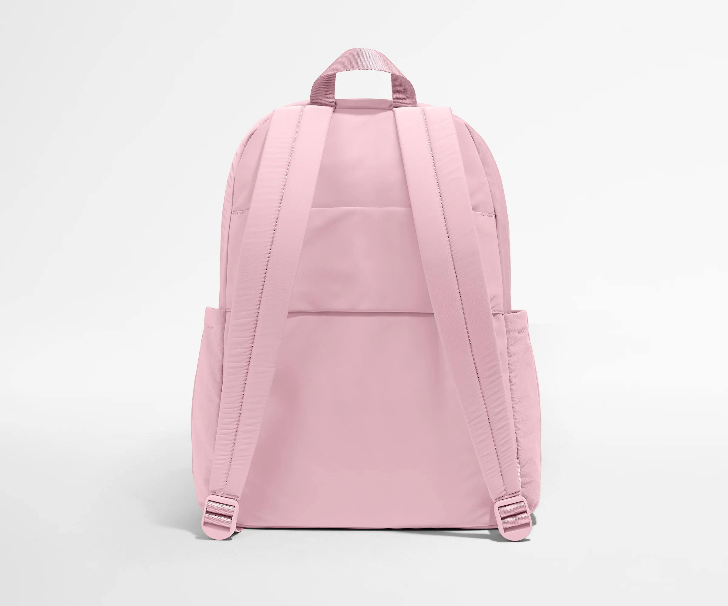 Pink backpack on a light gray background