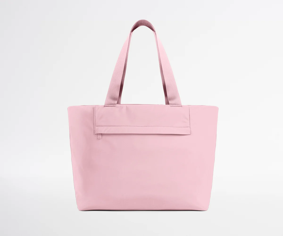 Pink tote bag on a light gray background