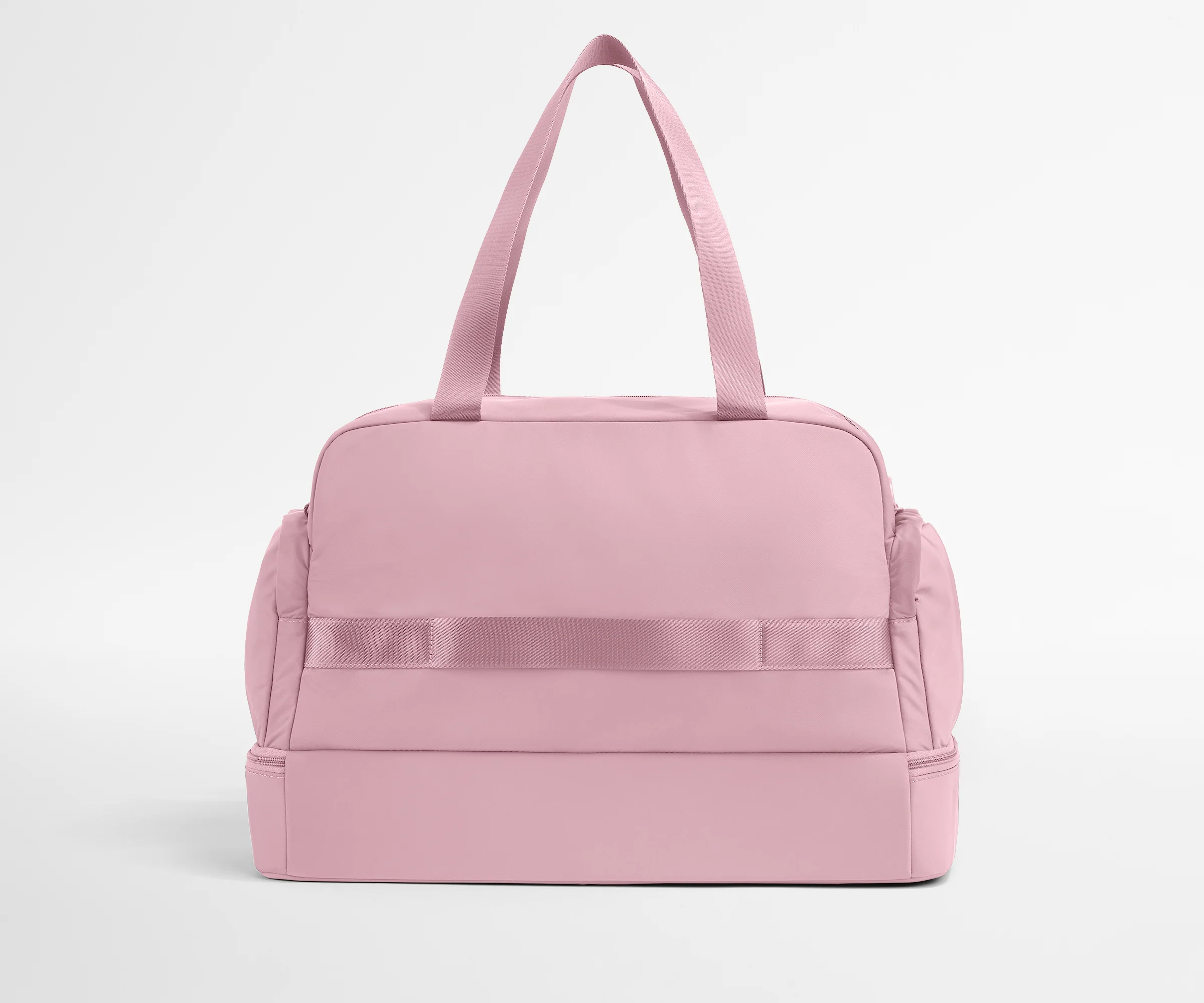 Pink duffel bag on a light gray background
