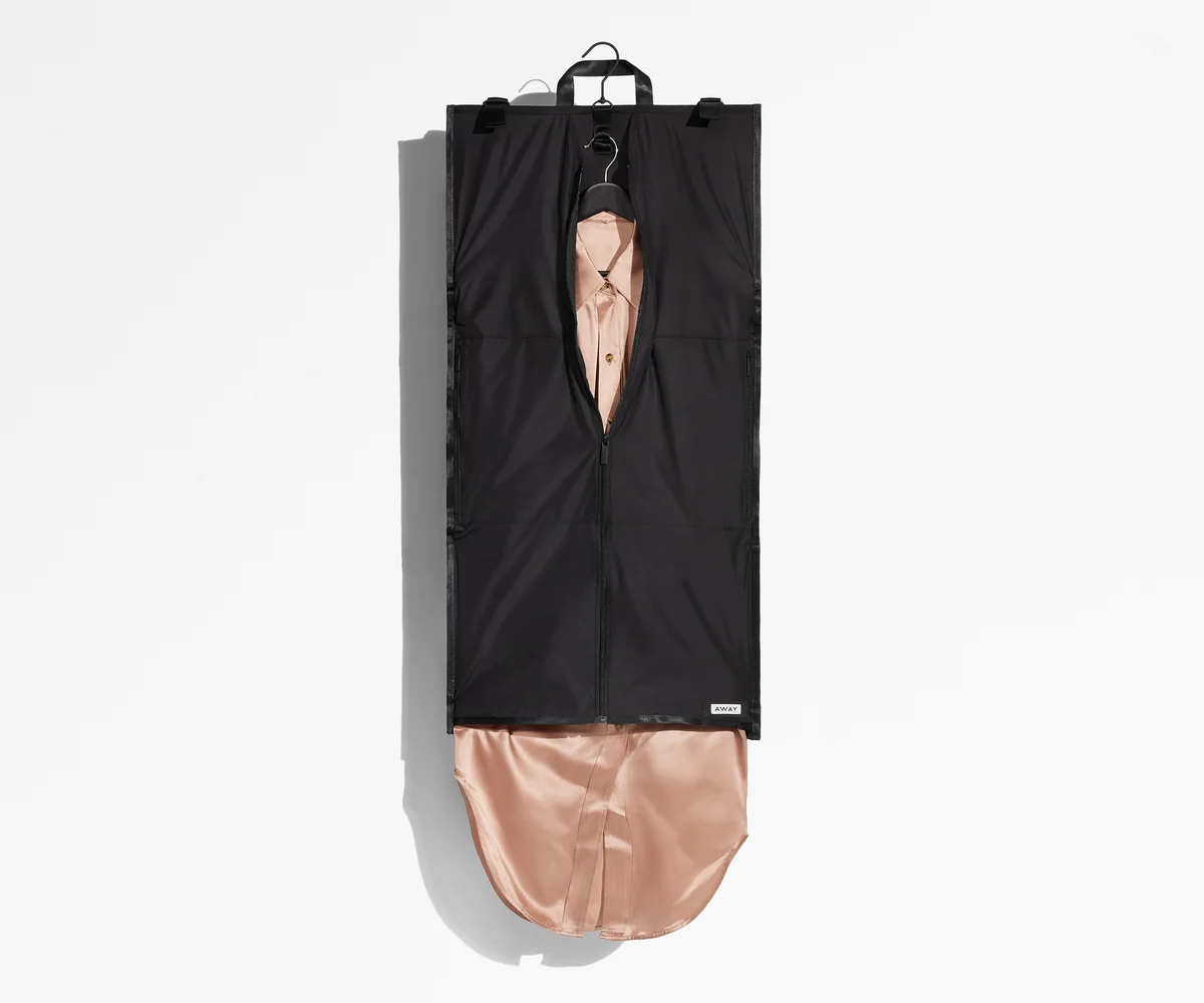 Carry-On sized Centerfold Garment Sleeve packed with a dress
