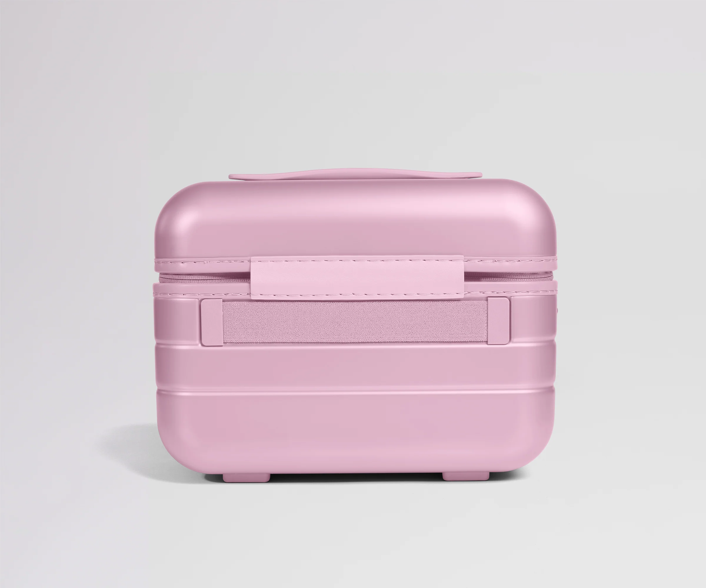 Pink travel case on a light gray background