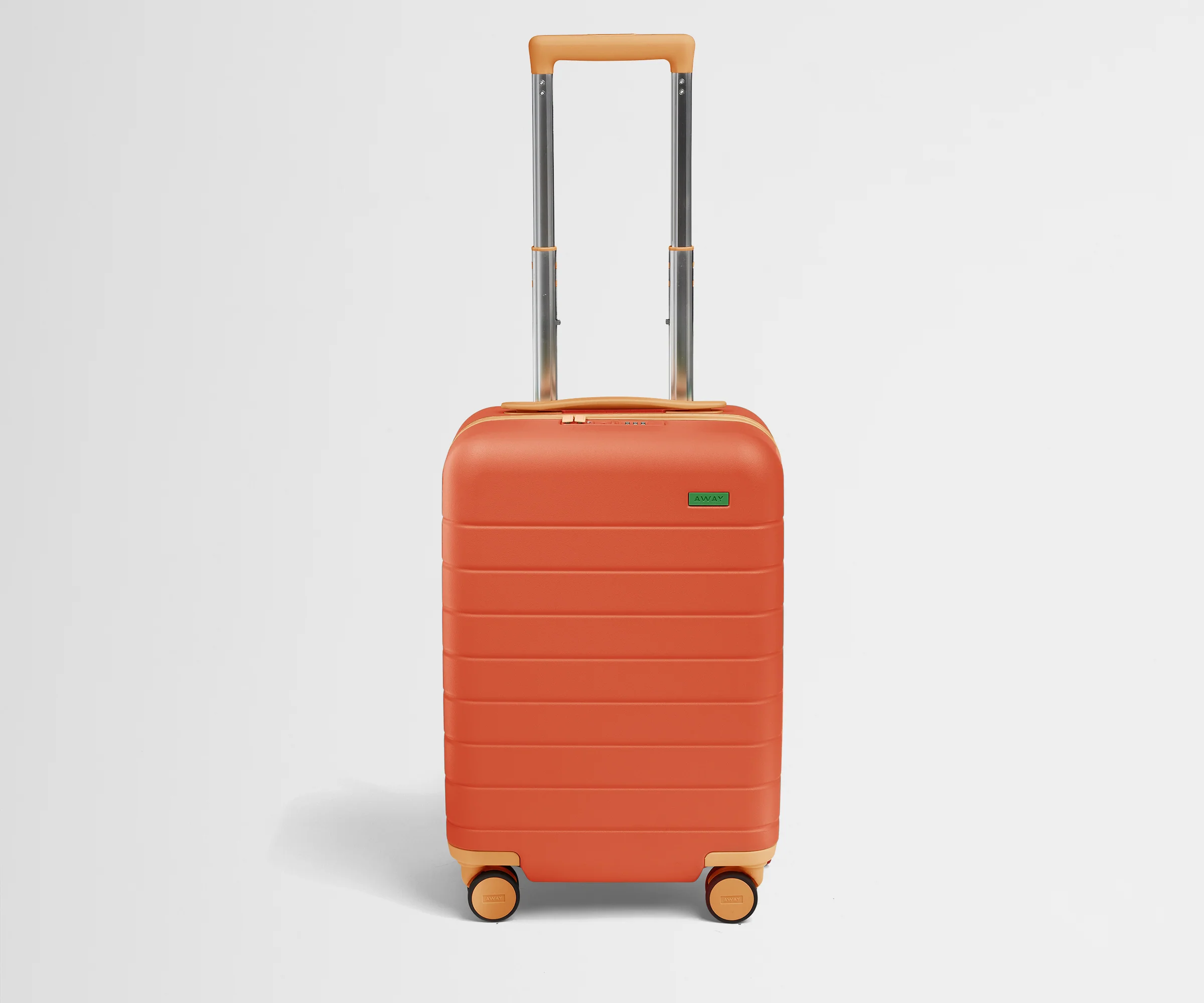 Front product view of The Kids Carry-On suitcase in Poppy Orange with raised handle