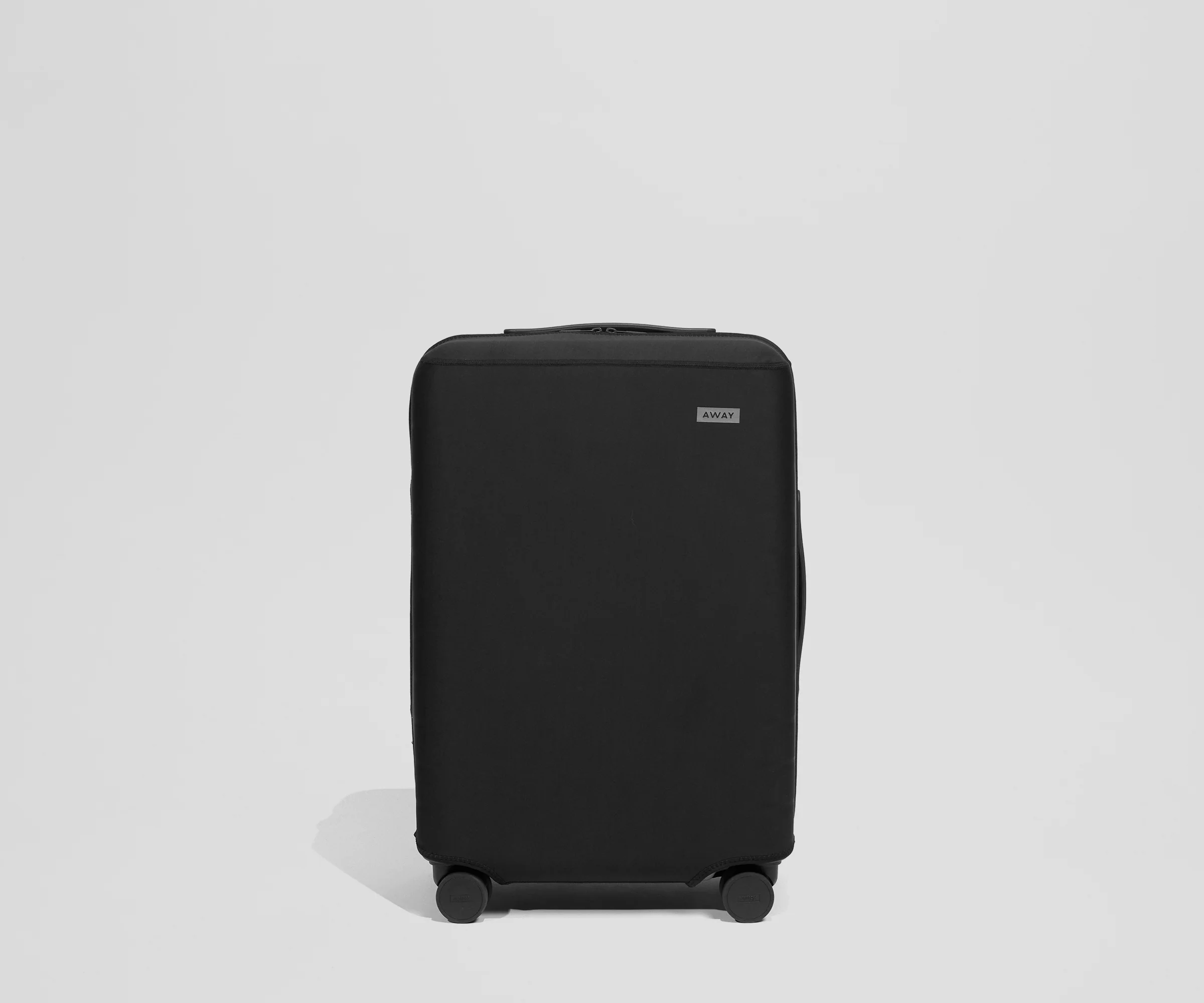 Fabric Luggage Cover in The Bigger Carry-On