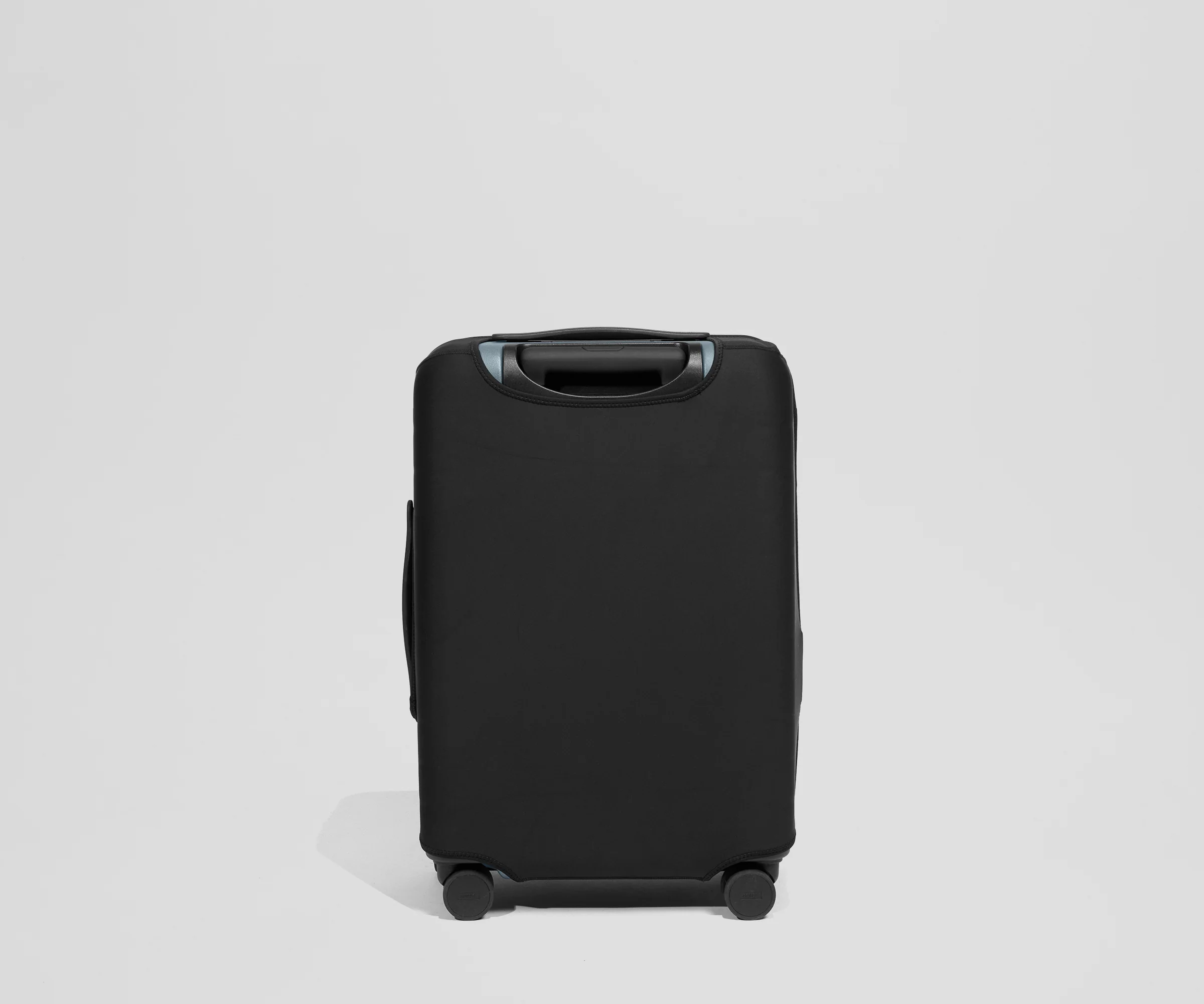 Fabric Luggage Cover in The Bigger Carry-On