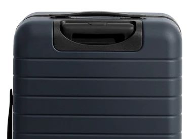 The Bigger Carry-On Flex in Navy Blue
