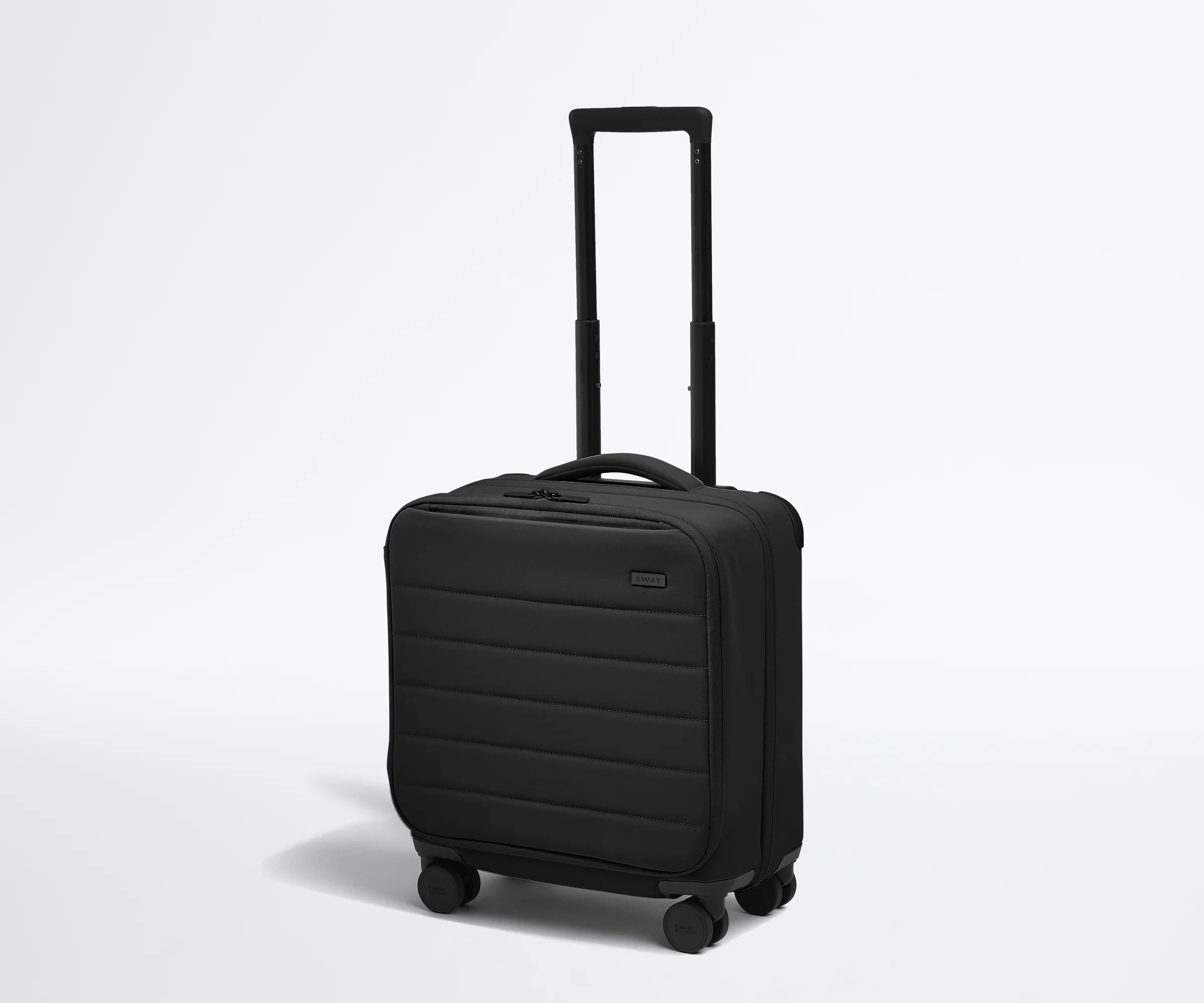Angled product view of The Softside Compact Carry-On suitcase in Jet Black with raised handle