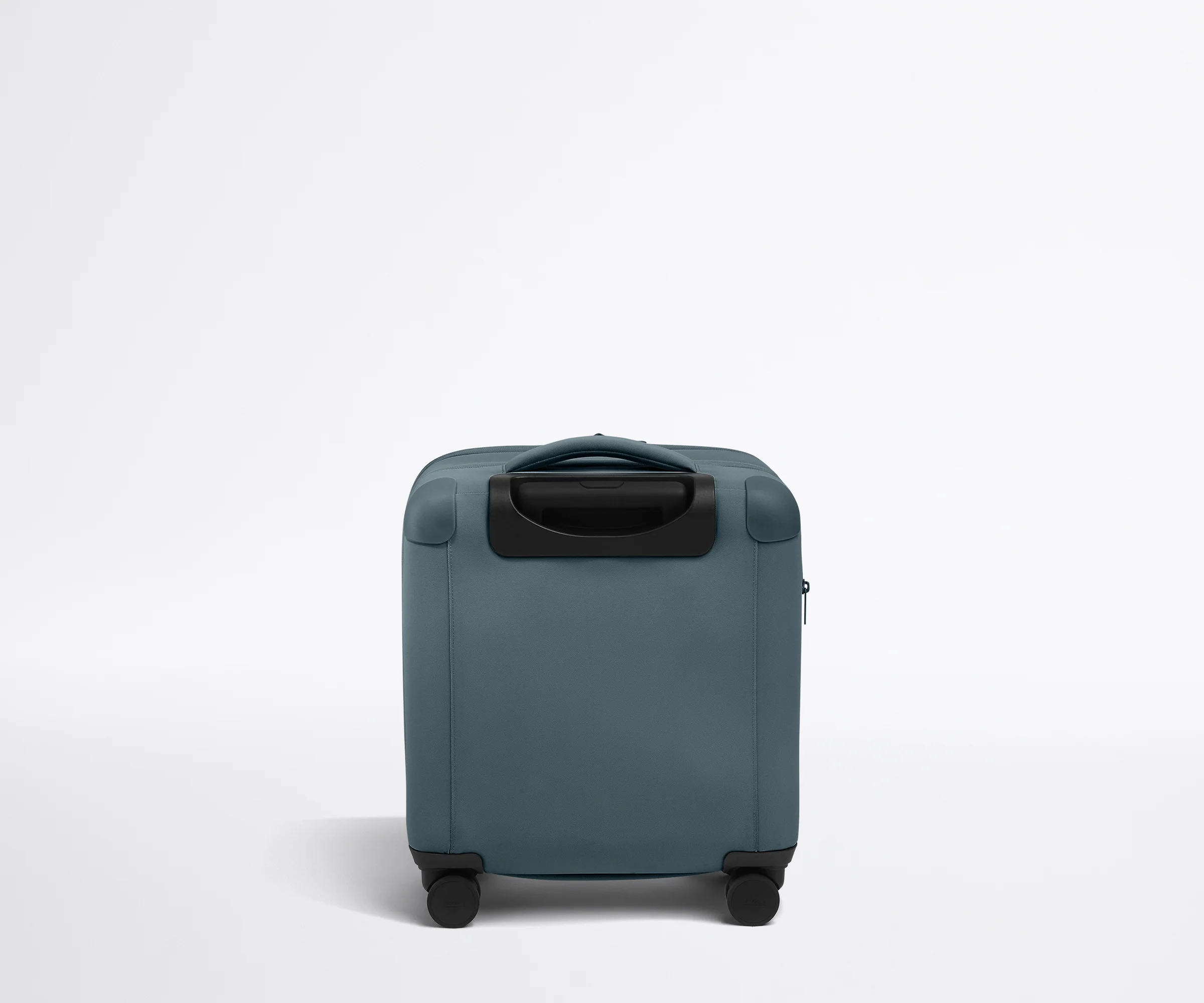 Back product view of The Softside Compact Carry-On suitcase in Coast Blue