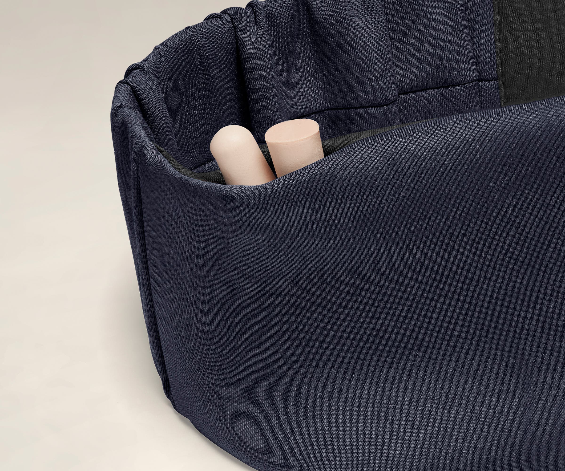 Discreet pocket with ear plugs