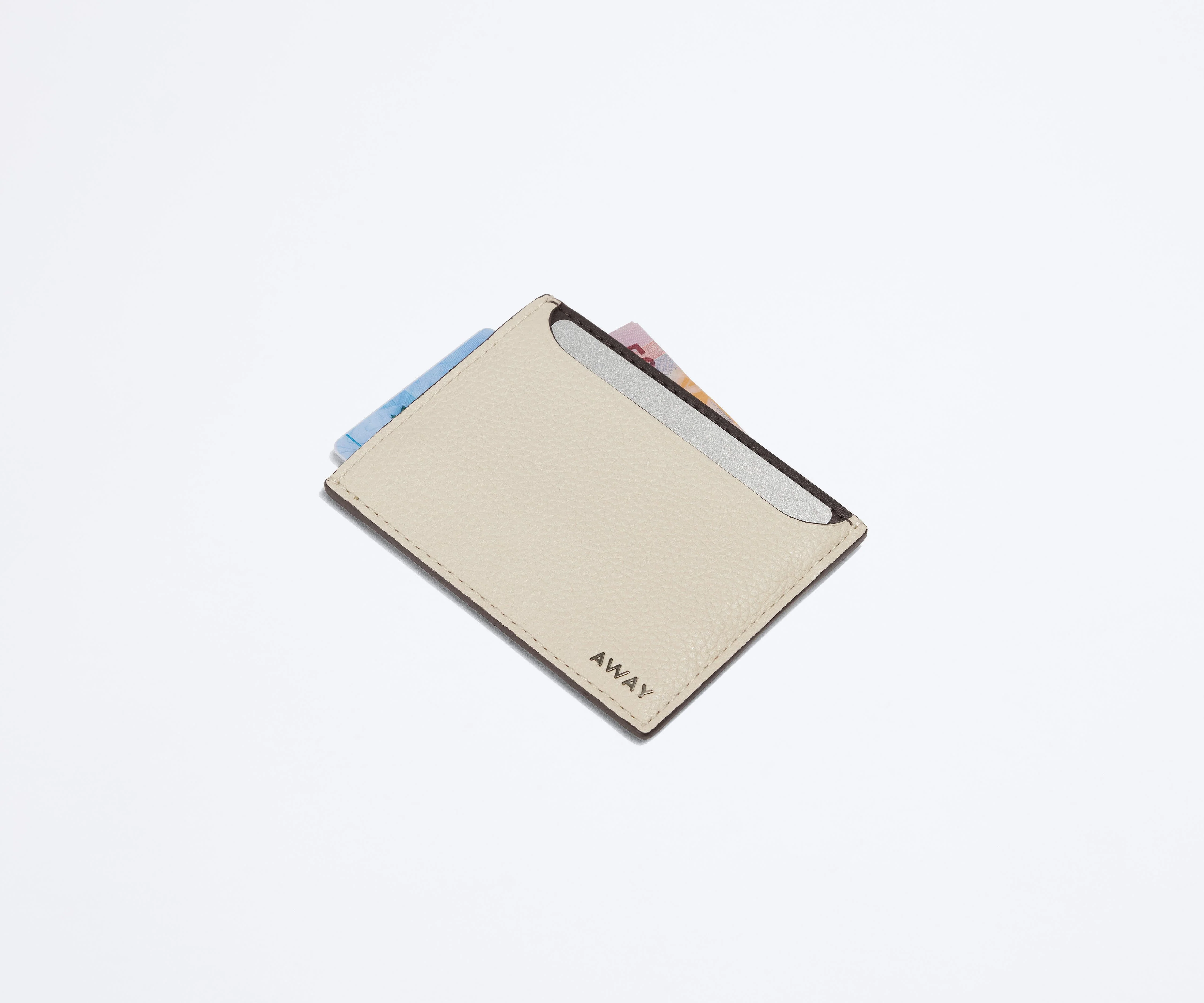Card case filled with money and credit cards
