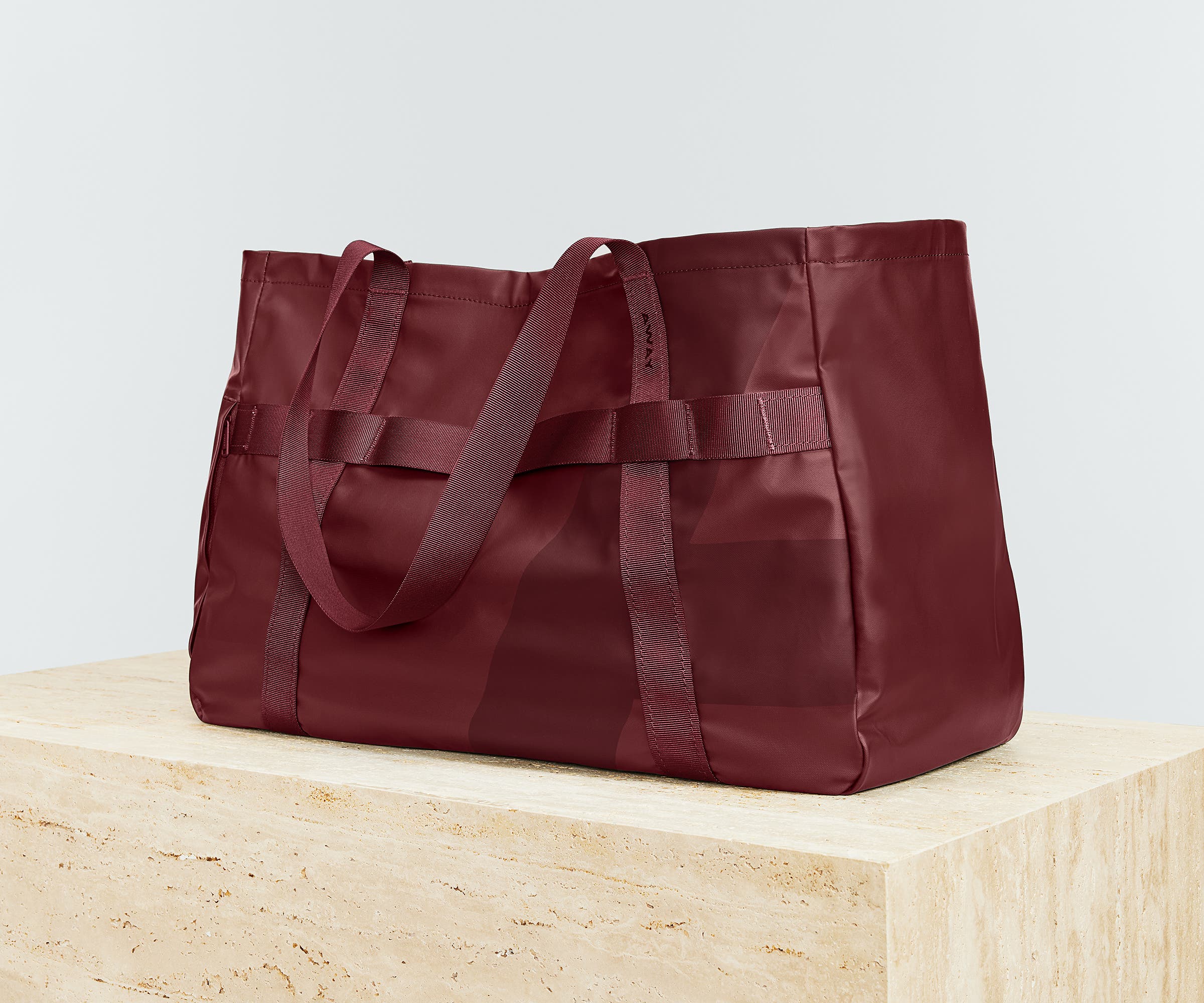 Angled view of the Active Tote 45L with the handles down