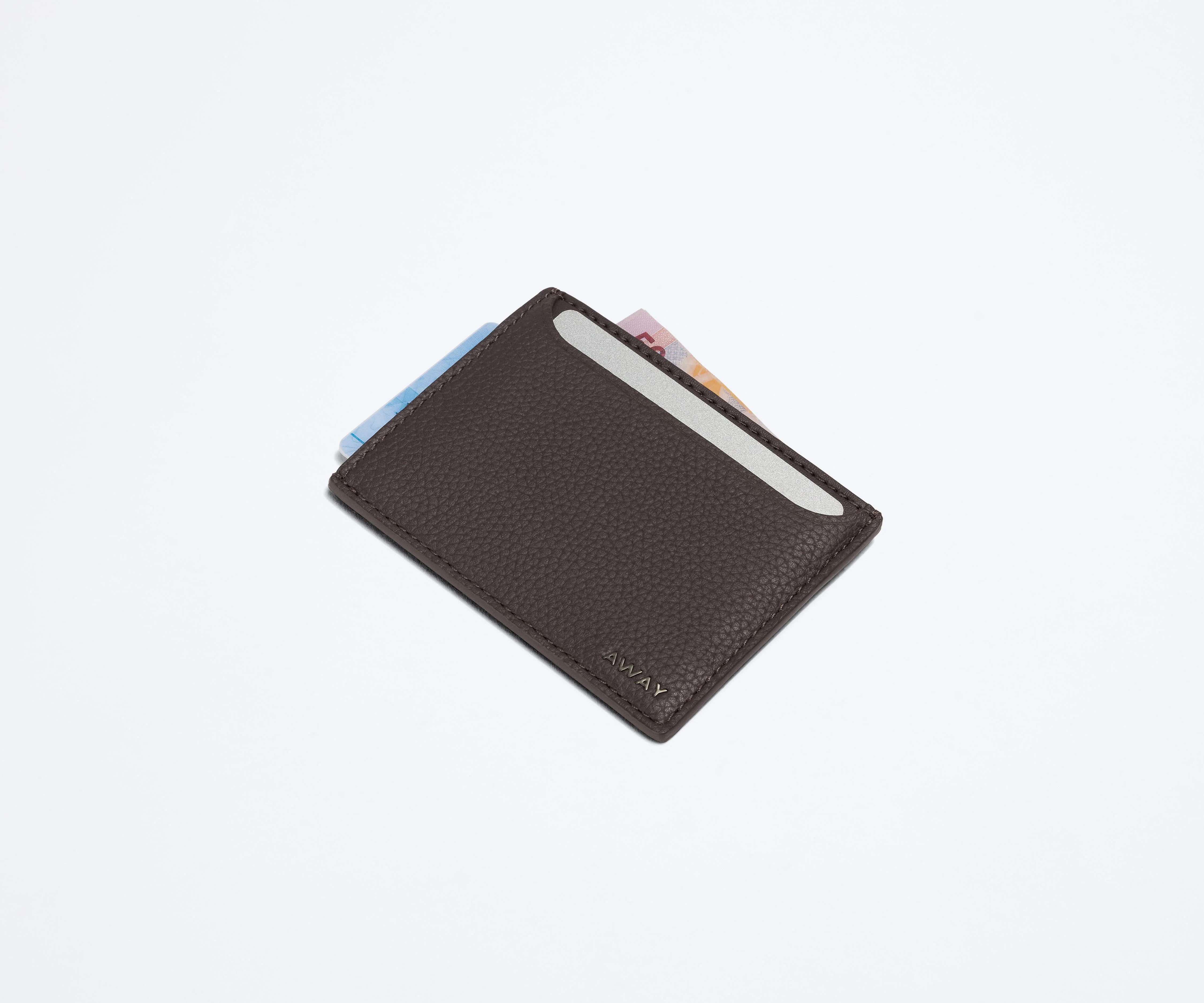 Card case filled with money and credit cards