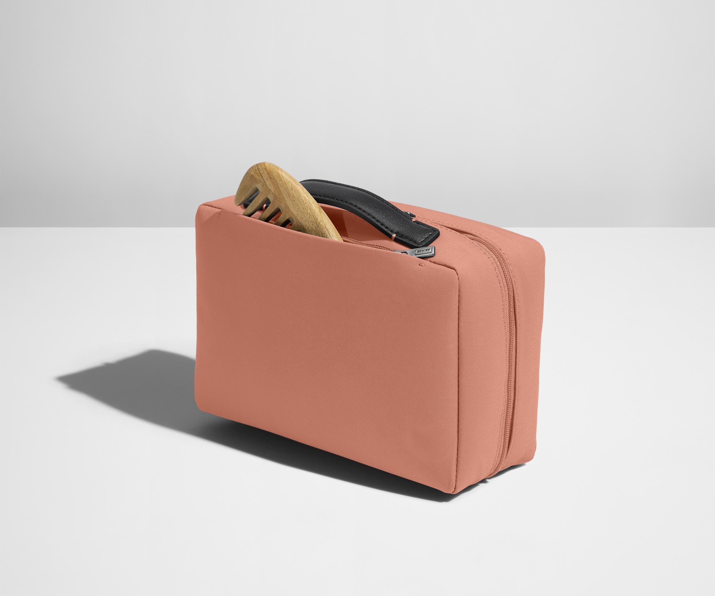 Comb packed in the exterior zip pocket