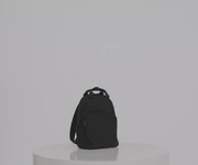 Video of a person packing the Featherlight Backpack with daily essentials