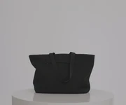 Video of a person packing the Featherlight Tote